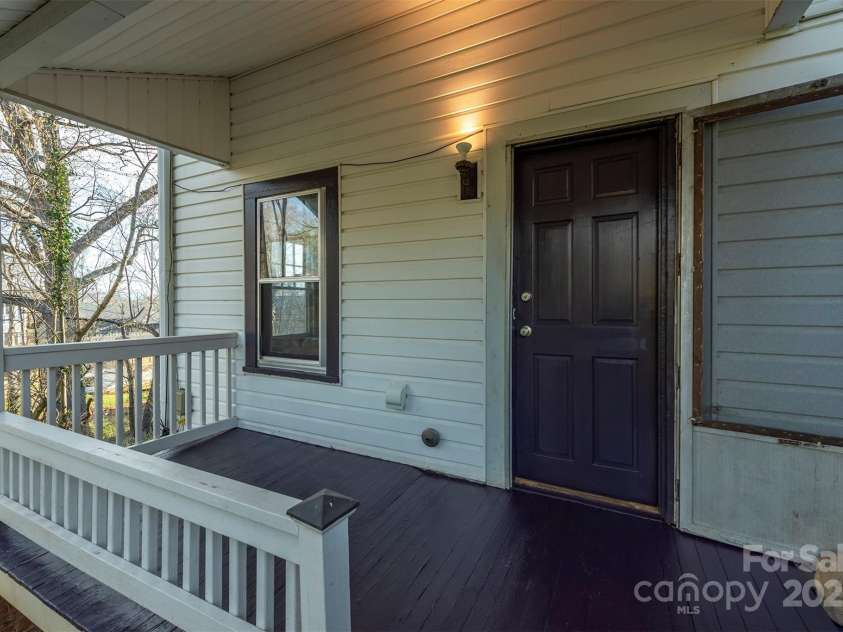 76 Oakwood Street, Asheville, NC 28806.  MLS# CAR4239865, YatesRealty ID 5459. Entry to lower apartment