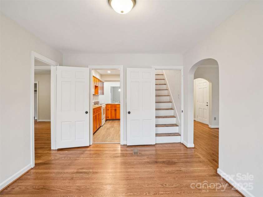 34 Parkview Drive, Brevard, NC 28712.  MLS# CAR4316145, YatesRealty ID 546. Dining Looking into Kitchen and upstairs