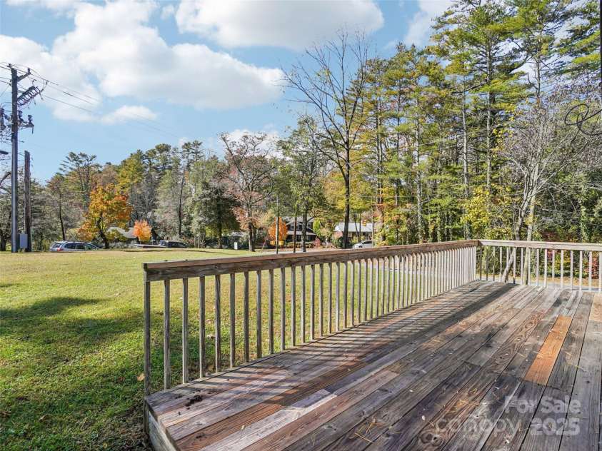 34 Parkview Drive, Brevard, NC 28712.  MLS# CAR4316145, YatesRealty ID 546. Side yard