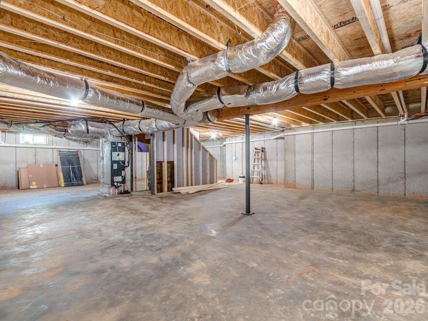 4899 Moonlite Bay Drive, Sherrills Ford, NC 28673.  MLS# CAR4343419, YatesRealty ID 5460. Unfinished basement