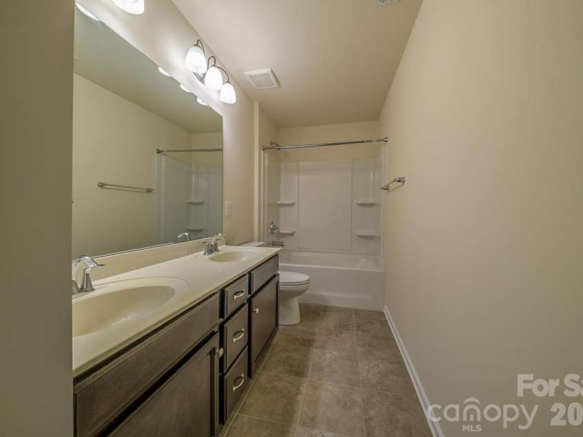 2004 Hudson Mill Drive, Waxhaw, NC 28173.  MLS# CAR4430158, YatesRealty ID 54600. 