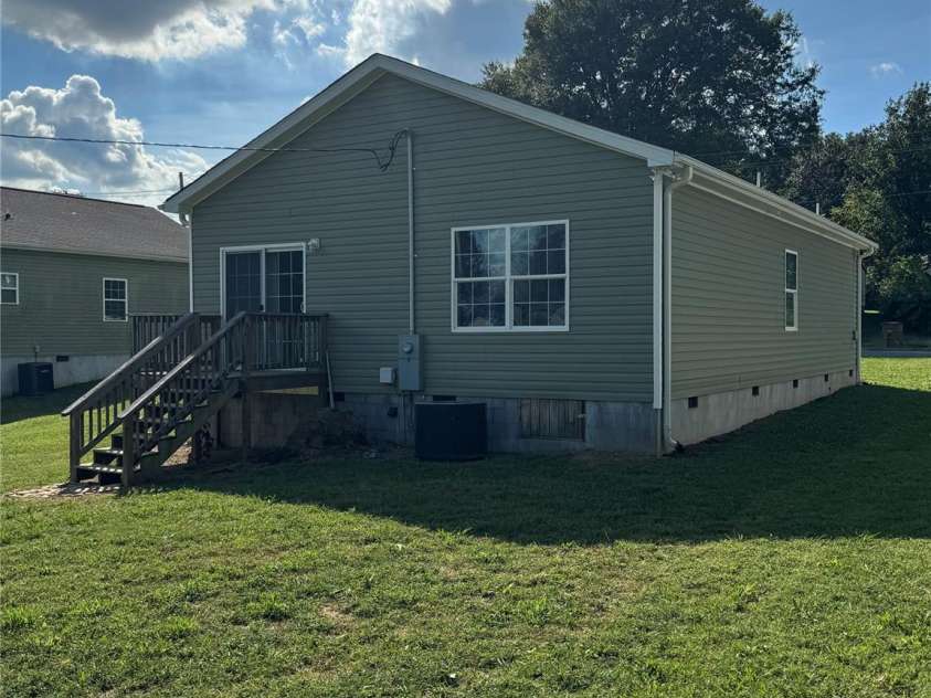 323 Martin Street, Shelby, NC 28150.  MLS# CAR4429863, YatesRealty ID 54603. Back and side view