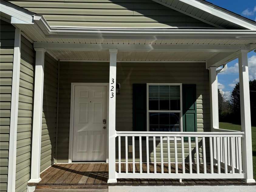 323 Martin Street, Shelby, NC 28150.  MLS# CAR4429863, YatesRealty ID 54603. Cozy front porch