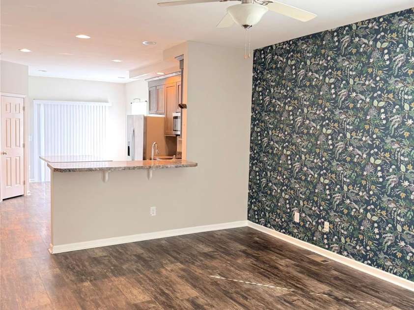 323 Martin Street, Shelby, NC 28150.  MLS# CAR4429863, YatesRealty ID 54603. Front door entry looking into living room and kitchen