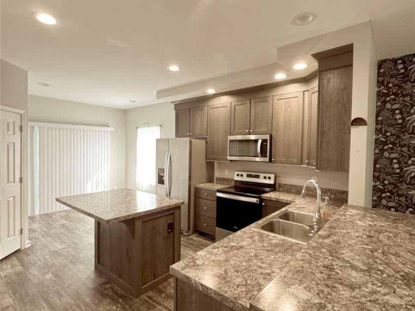 323 Martin Street, Shelby, NC 28150.  MLS# CAR4429863, YatesRealty ID 54603. Open kitchen with tons of cabinet space