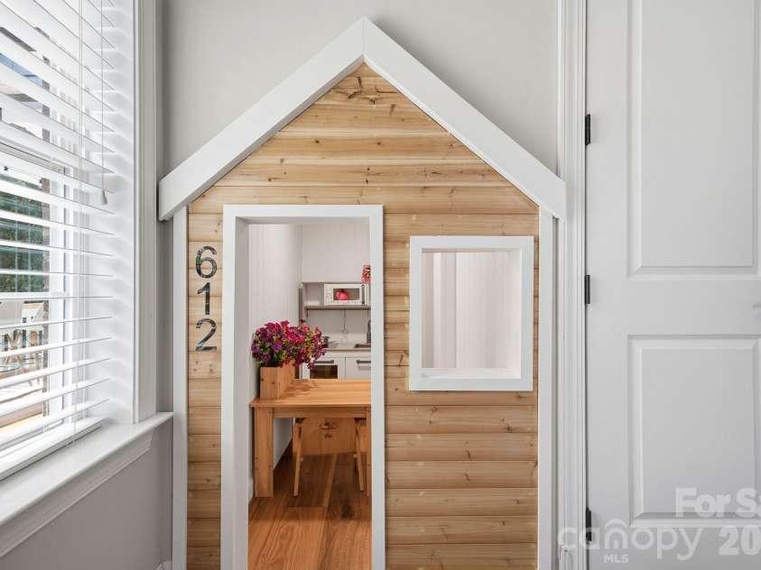 612 Highland Ridge Point, Clover, SC 29710.  MLS# CAR4424384, YatesRealty ID 54612. Custom built in playhouse/hiding nook
