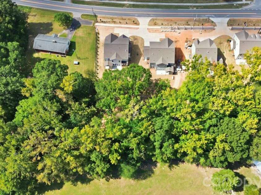 4927 Potter Road, Matthews, NC 28104.  MLS# CAR4430466, YatesRealty ID 54614. 