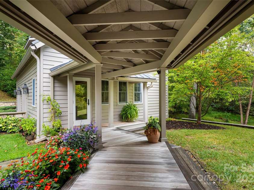 195 Meadow Creek Drive, Weaverville, NC 28787.  MLS# CAR4245670, YatesRealty ID 5462. Walkway to garage