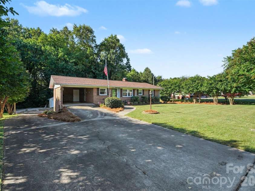 211 21st Street, Kannapolis, NC 28081.  MLS# CAR4430291, YatesRealty ID 54629. Another front view displaying parking options