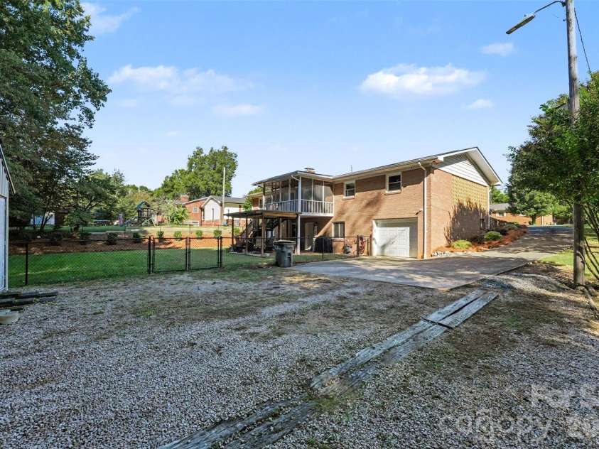 211 21st Street, Kannapolis, NC 28081.  MLS# CAR4430291, YatesRealty ID 54629. Back yard - fenced.   Also, ample parking for multiple vehicles or a camper or RV