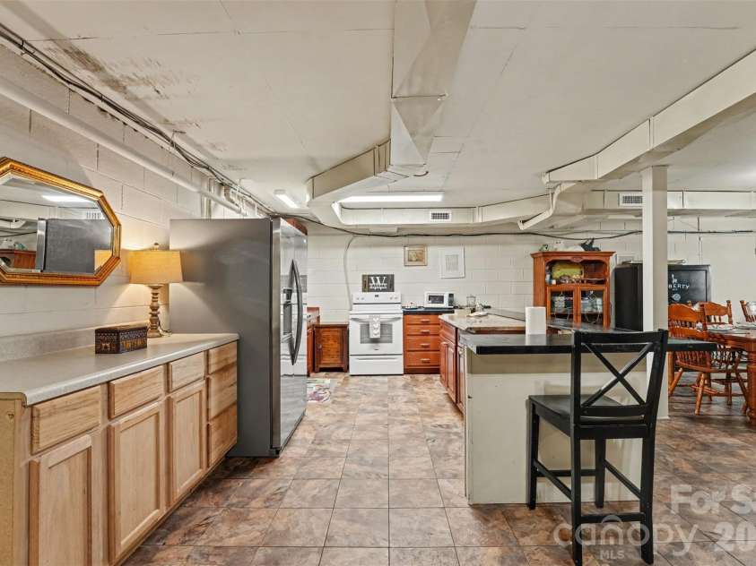 211 21st Street, Kannapolis, NC 28081.  MLS# CAR4430291, YatesRealty ID 54629. Full kitchen in the basement