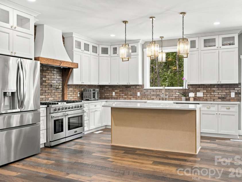 1020 Rock Pond Lane, Salisbury, NC 28146.  MLS# CAR4430684, YatesRealty ID 54636. Cabinets extend to ceiling with soft close hardware