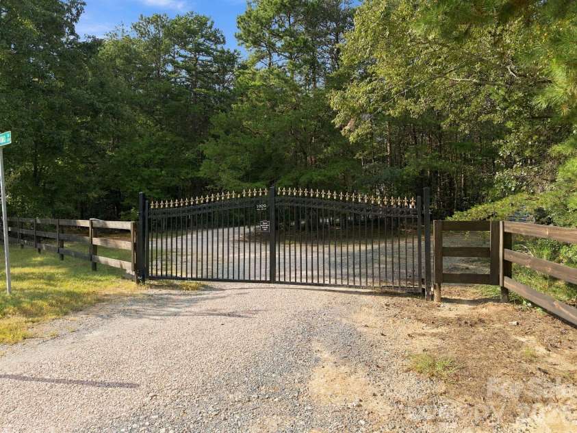 1020 Rock Pond Lane, Salisbury, NC 28146.  MLS# CAR4430684, YatesRealty ID 54636. Electric entry gate