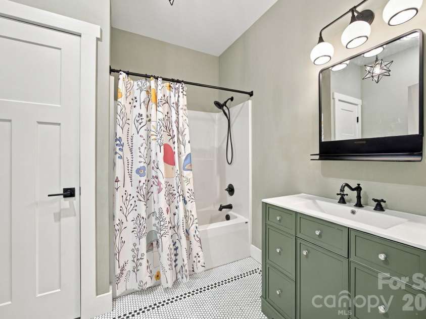 1020 Rock Pond Lane, Salisbury, NC 28146.  MLS# CAR4430684, YatesRealty ID 54636. Hall bathroom features custom tile
