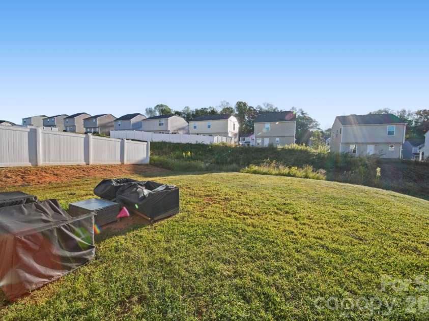 723 Quail Lane, Lexington, NC 27292.  MLS# CAR4430604, YatesRealty ID 54637. Back Yard