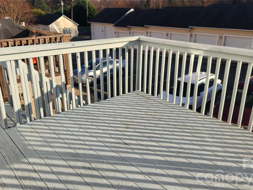 110 Steam Engine Drive, Mooresville, NC 28115.  MLS# CAR4430881, YatesRealty ID 54638. Deck and assigned parking space below