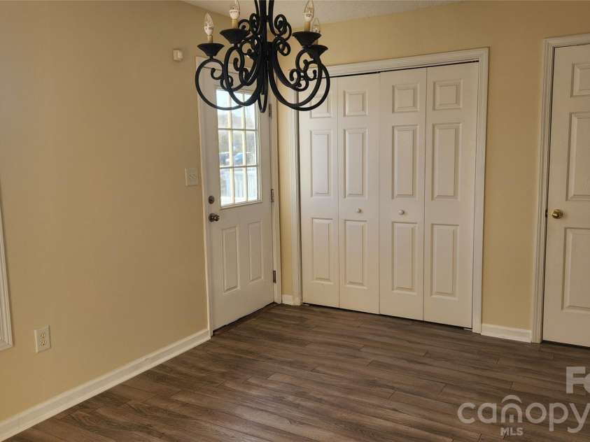 110 Steam Engine Drive, Mooresville, NC 28115.  MLS# CAR4430881, YatesRealty ID 54638. Dining Room and back door to deck