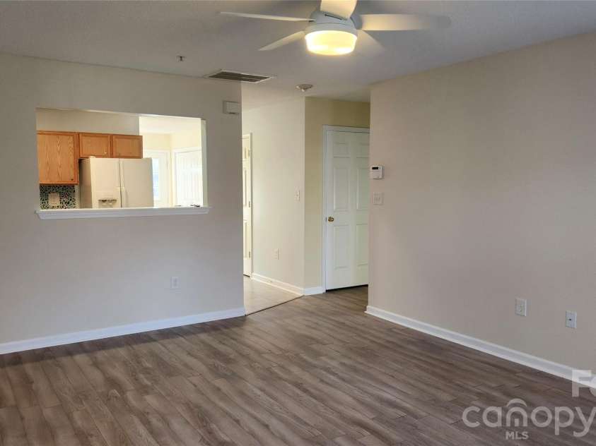 110 Steam Engine Drive, Mooresville, NC 28115.  MLS# CAR4430881, YatesRealty ID 54638. Living Room towards Kitchen