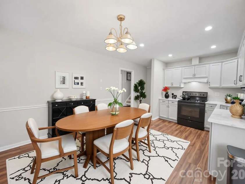 3323 Wiseman Drive, Charlotte, NC 28227.  MLS# CAR4428962, YatesRealty ID 54639. Dinning virtual staging only