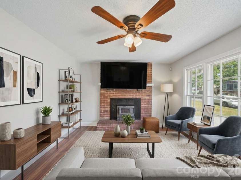 3323 Wiseman Drive, Charlotte, NC 28227.  MLS# CAR4428962, YatesRealty ID 54639. Living room virtual staging only