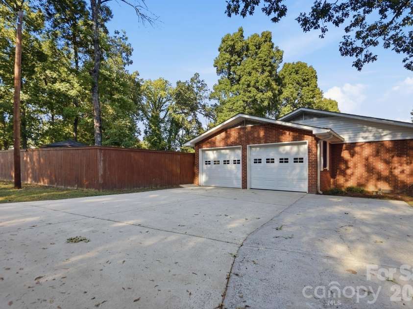 140 Piedmont Drive, Kannapolis, NC 28081.  MLS# CAR4428952, YatesRealty ID 54646. 2-Car Attached Garage, Side Load