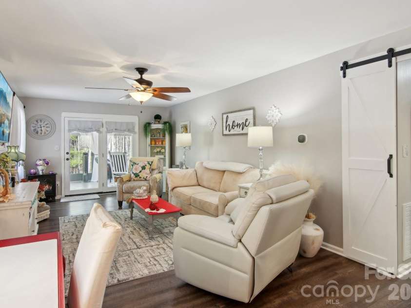 6 Calico Lane, Etowah, NC 28729.  MLS# CAR4215890, YatesRealty ID 5465. Barn Door To Hallway