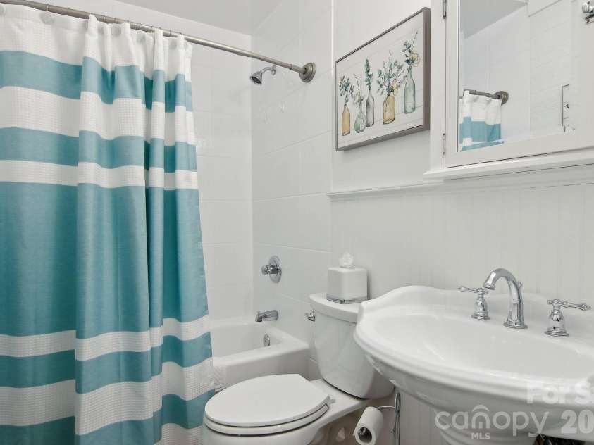 6 Calico Lane, Etowah, NC 28729.  MLS# CAR4215890, YatesRealty ID 5465. Downstairs Bathroom
