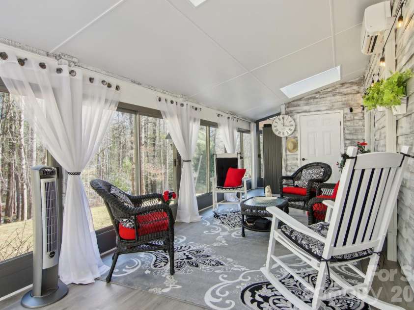 6 Calico Lane, Etowah, NC 28729.  MLS# CAR4215890, YatesRealty ID 5465. Heated Sun Room