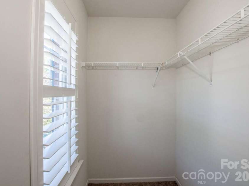 16908 Hampton Crossing Drive, Huntersville, NC 28078.  MLS# CAR4427172, YatesRealty ID 54652. Bedroom 2 Walk-In Closet