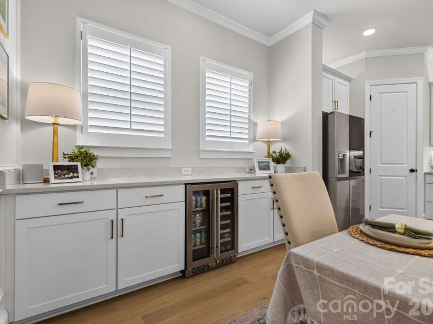 1018 Lowland Way, Waxhaw, NC 28173.  MLS# CAR4427578, YatesRealty ID 54654. Buffet Cabinet with Wine and Beverage Refrigerator