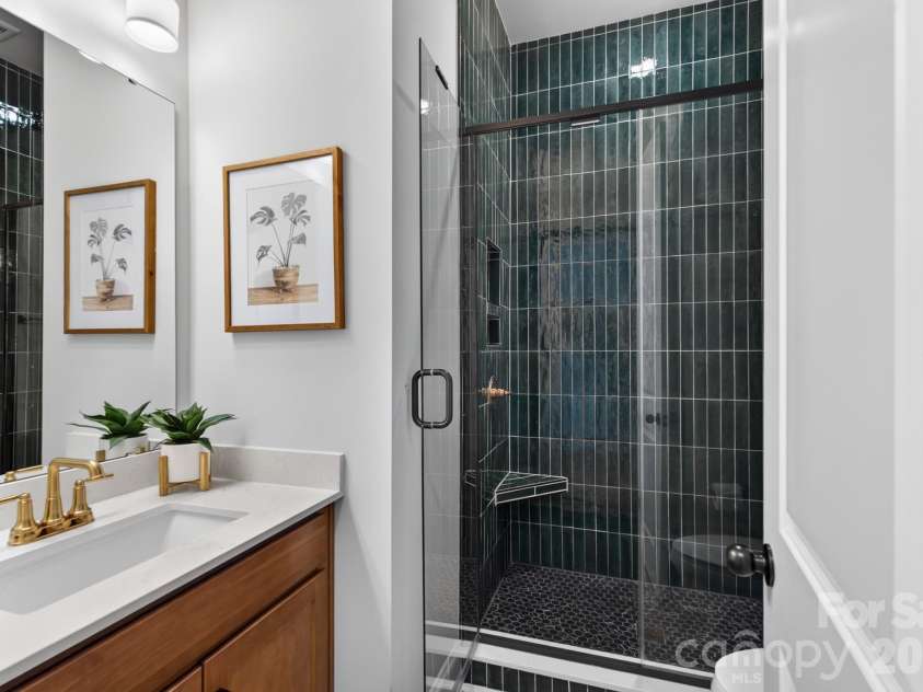 1018 Lowland Way, Waxhaw, NC 28173.  MLS# CAR4427578, YatesRealty ID 54654. Front Secondary Bathroom
