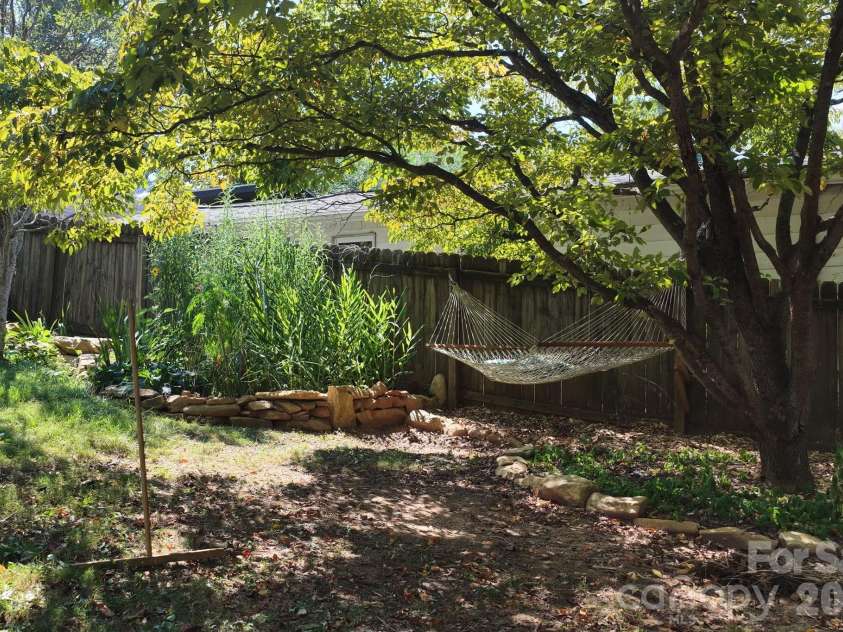 201 Logan Avenue, Asheville, NC 28806.  MLS# CAR4426540, YatesRealty ID 54658. Relaxing Shade Tree