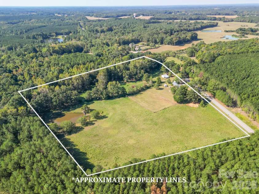 7615 Rocky River Road, Union, NC 28112.  MLS# CAR4430607, YatesRealty ID 54670. Cleared pasture