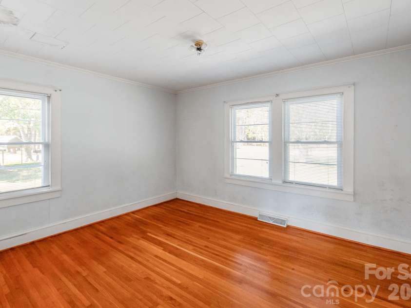 7615 Rocky River Road, Union, NC 28112.  MLS# CAR4430607, YatesRealty ID 54670. Front Bedroom (carport side)