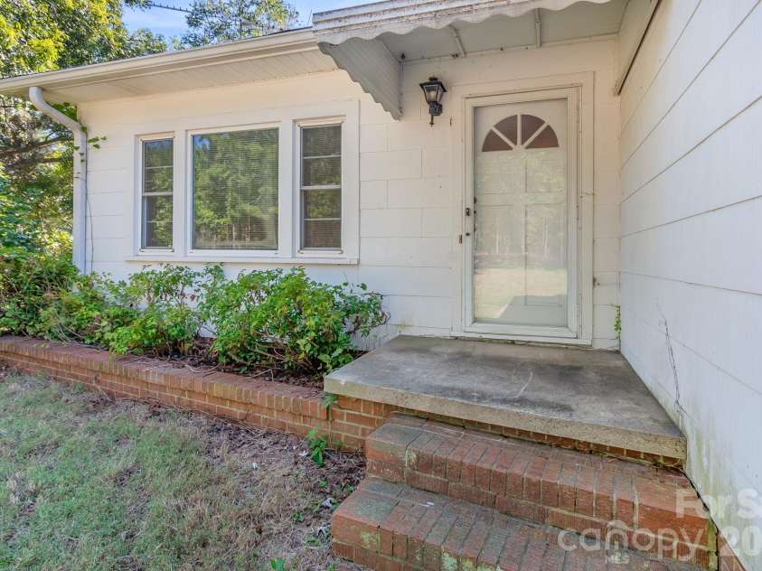 7615 Rocky River Road, Union, NC 28112.  MLS# CAR4430607, YatesRealty ID 54670. Front entry