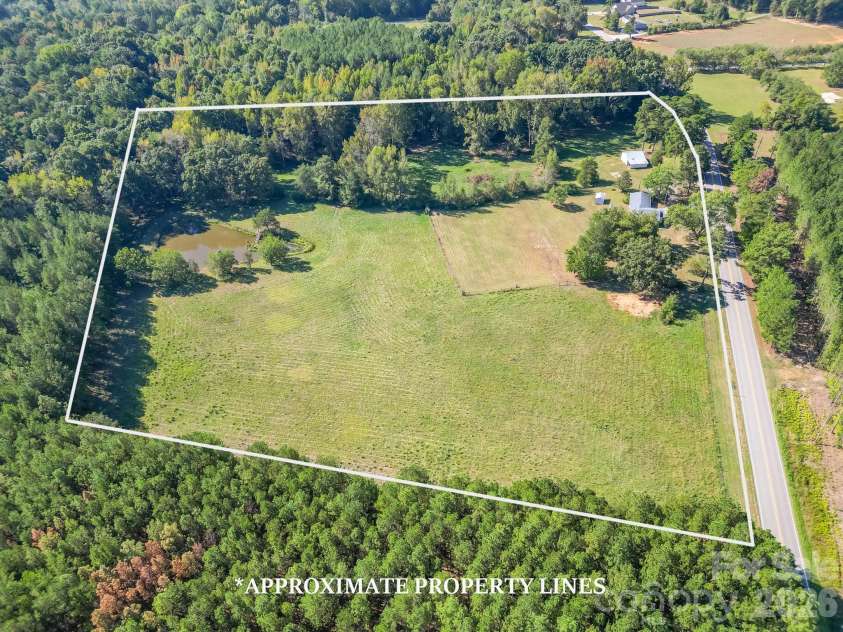 7615 Rocky River Road, Union, NC 28112.  MLS# CAR4430607, YatesRealty ID 54670. Home plus barn shed