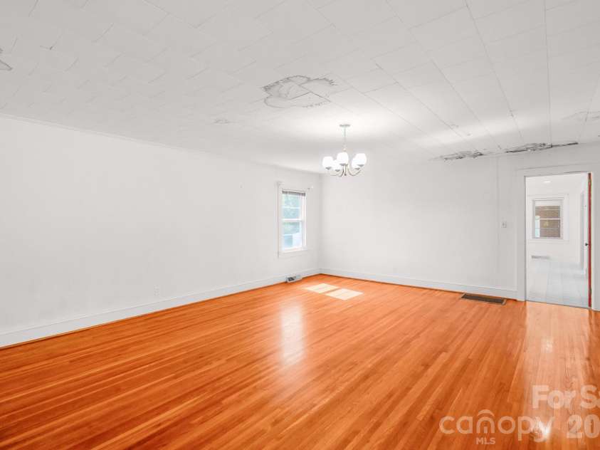 7615 Rocky River Road, Union, NC 28112.  MLS# CAR4430607, YatesRealty ID 54670. Original hardwoods