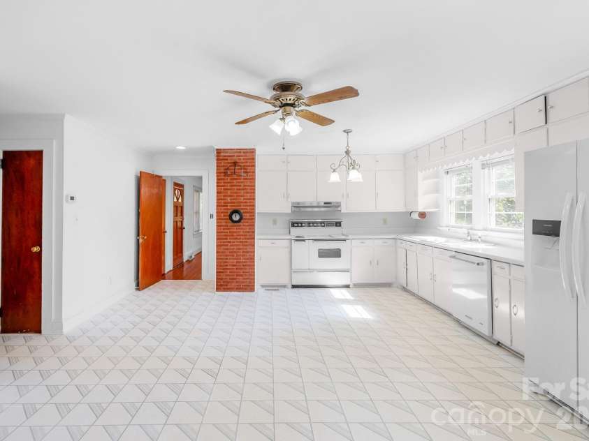 7615 Rocky River Road, Union, NC 28112.  MLS# CAR4430607, YatesRealty ID 54670. View from kitchen looking into living room
