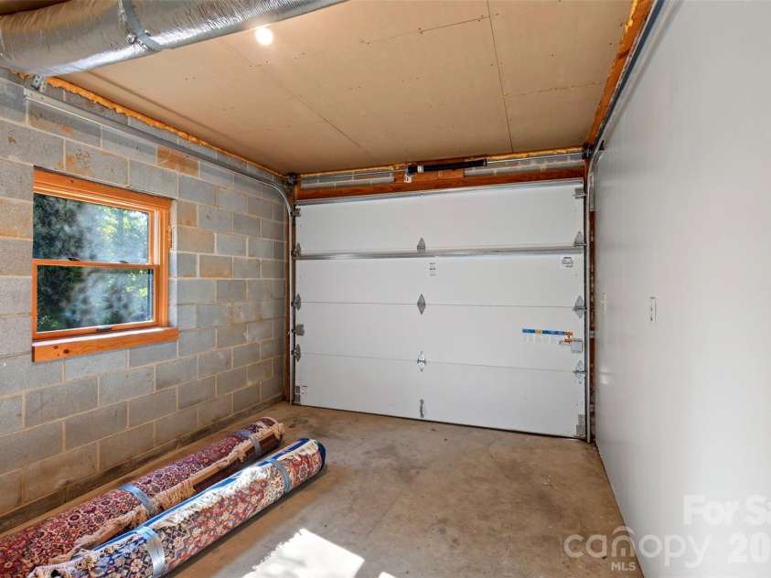 53 Hemlock Street, Arden, NC 28704.  MLS# CAR4430956, YatesRealty ID 54671. 1-car garage