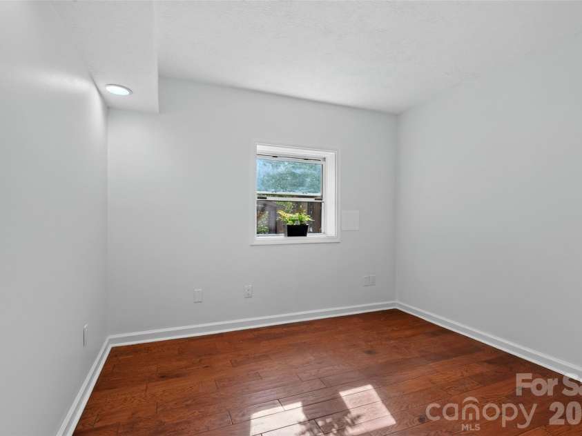 53 Hemlock Street, Arden, NC 28704.  MLS# CAR4430956, YatesRealty ID 54671. Downstairs bedroom