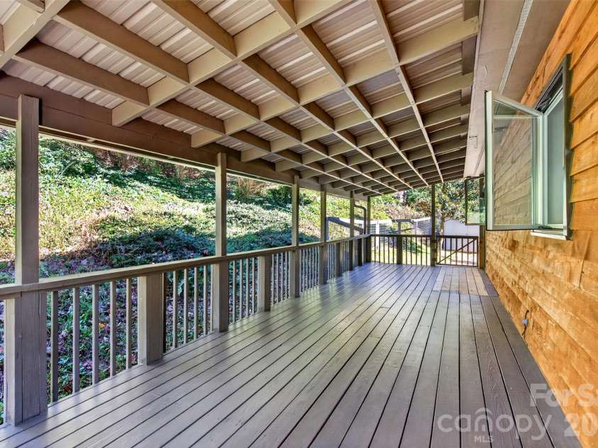 53 Hemlock Street, Arden, NC 28704.  MLS# CAR4430956, YatesRealty ID 54671. Giant covered back deck