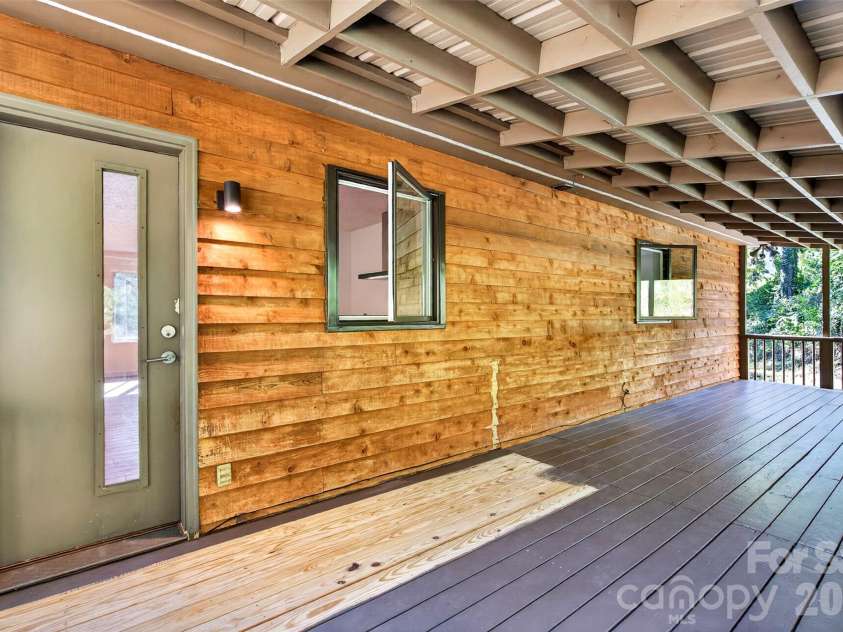 53 Hemlock Street, Arden, NC 28704.  MLS# CAR4430956, YatesRealty ID 54671. Giant covered back deck