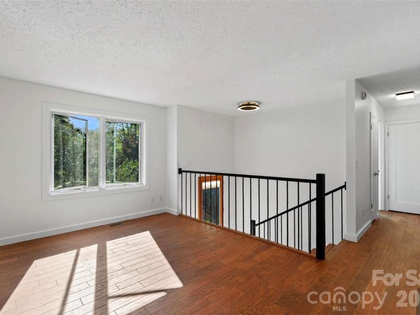 53 Hemlock Street, Arden, NC 28704.  MLS# CAR4430956, YatesRealty ID 54671. Living room