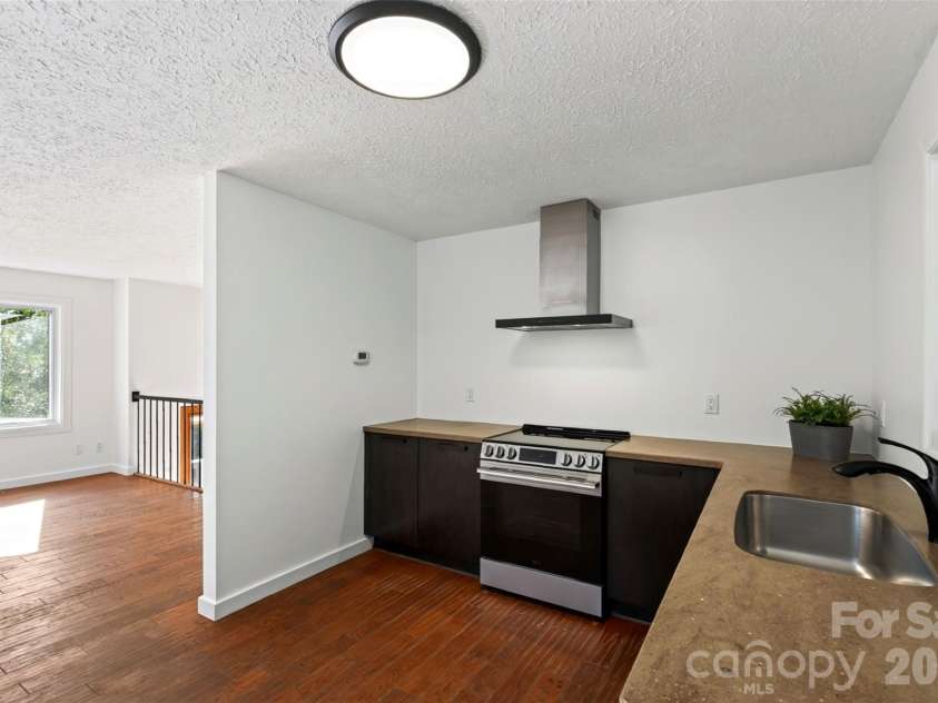 53 Hemlock Street, Arden, NC 28704.  MLS# CAR4430956, YatesRealty ID 54671. Modern kitchen