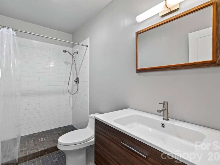 53 Hemlock Street, Arden, NC 28704.  MLS# CAR4430956, YatesRealty ID 54671. Upstairs bathroom