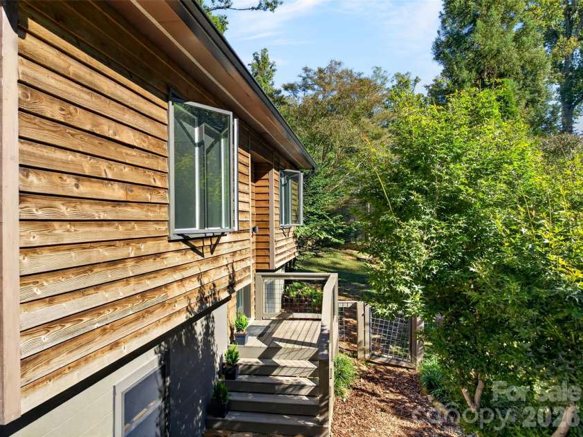 53 Hemlock Street, Arden, NC 28704.  MLS# CAR4430956, YatesRealty ID 54671. Welcoming front porch