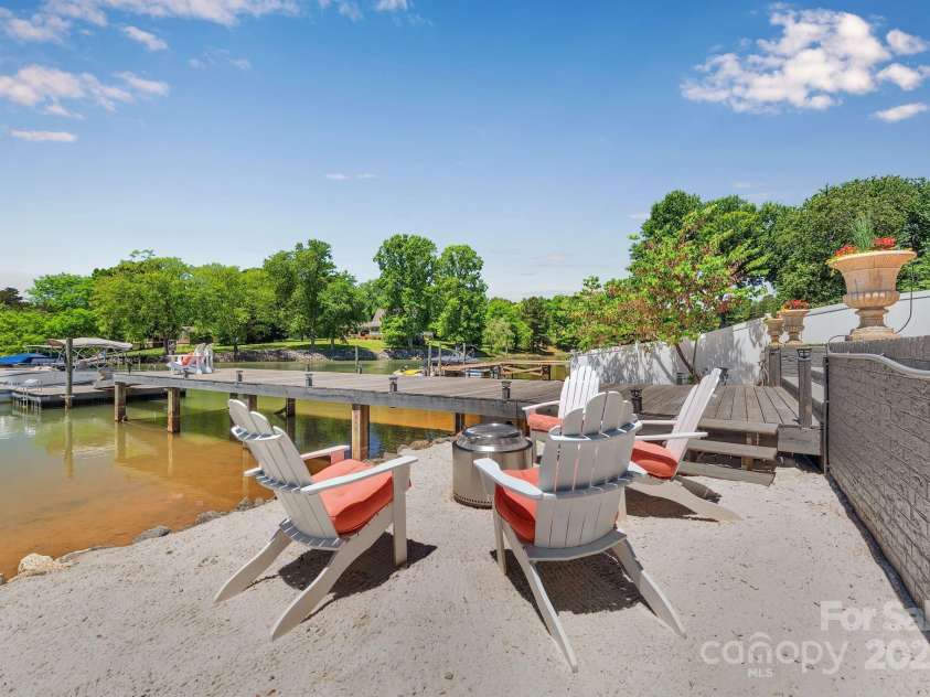 8150 Malibu Pointe Lane, Denver, NC 28037.  MLS# CAR4234717, YatesRealty ID 5468. Enjoy a fire by the lake after coming in from a hard day of boating.