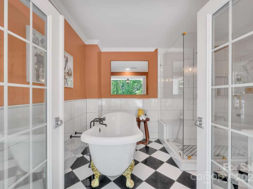 8150 Malibu Pointe Lane, Denver, NC 28037.  MLS# CAR4234717, YatesRealty ID 5468. Enjoy spa like baths in the clawfoot tub overlooking front balcony.