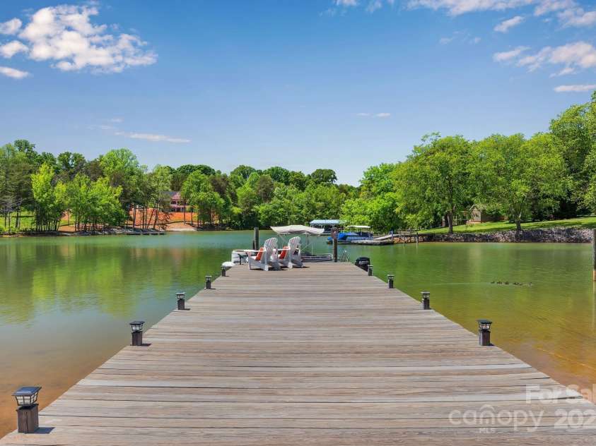 8150 Malibu Pointe Lane, Denver, NC 28037.  MLS# CAR4234717, YatesRealty ID 5468. Extra wide pier with dock lights.