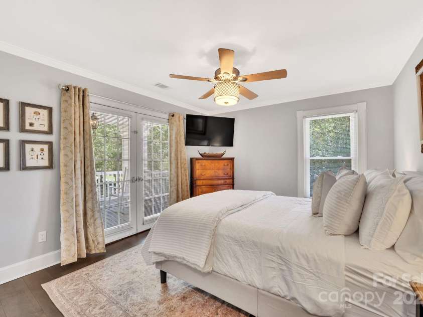 8150 Malibu Pointe Lane, Denver, NC 28037.  MLS# CAR4234717, YatesRealty ID 5468. Front bedroom with lake views and direct access to front balcony